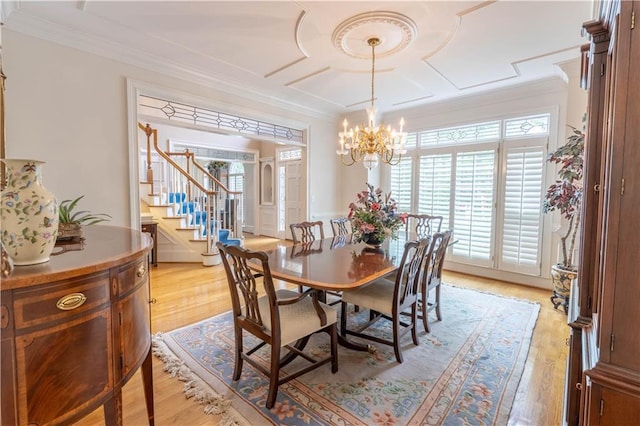 54 Old Fuller Mill Road Ne, Marietta, GA 30067 - dining area with a notable chandelier, crown molding, and light hardwood / wood-style floors