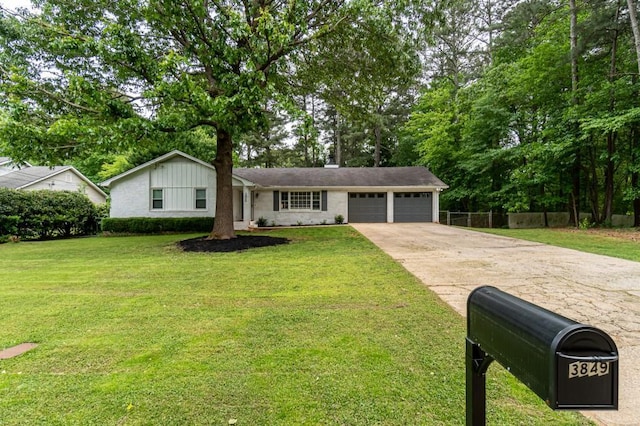 ranch-style house with a front lawn and a garage