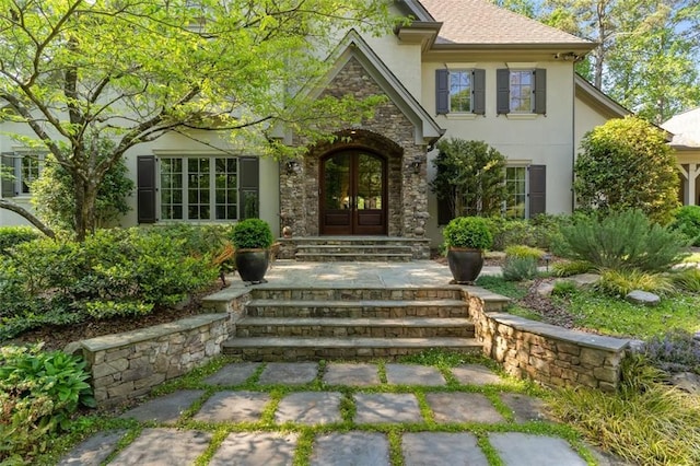 entrance to property featuring french doors