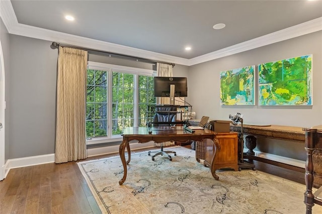 office space with dark hardwood / wood-style flooring and crown molding