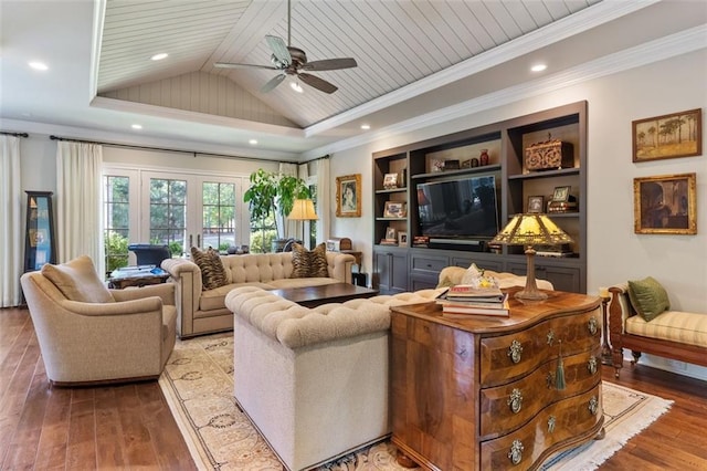 living room featuring dark hardwood / wood-style flooring, ceiling fan, crown molding, and french doors