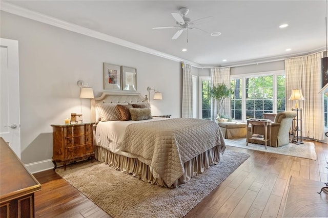 bedroom featuring crown molding, ceiling fan, and light hardwood / wood-style flooring