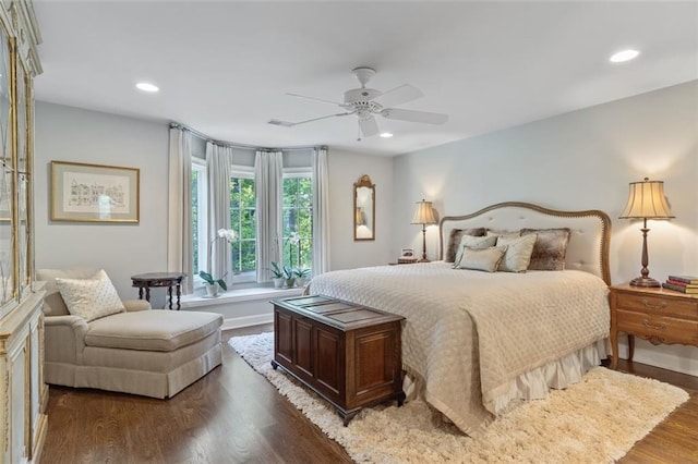 bedroom featuring ceiling fan and hardwood / wood-style flooring