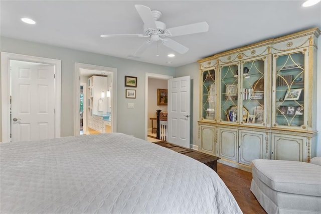 bedroom with ceiling fan and dark wood-type flooring