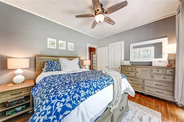 3248 W Shadowlawn Avenue Ne, Atlanta, GA 30305 - bedroom featuring ceiling fan, crown molding, and dark wood-type flooring