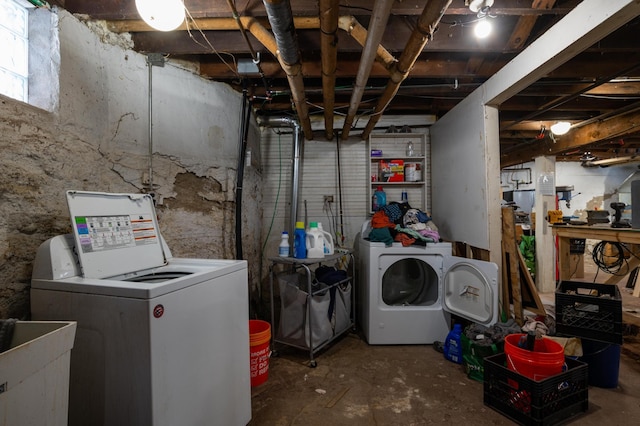 washroom with sink and washer and clothes dryer