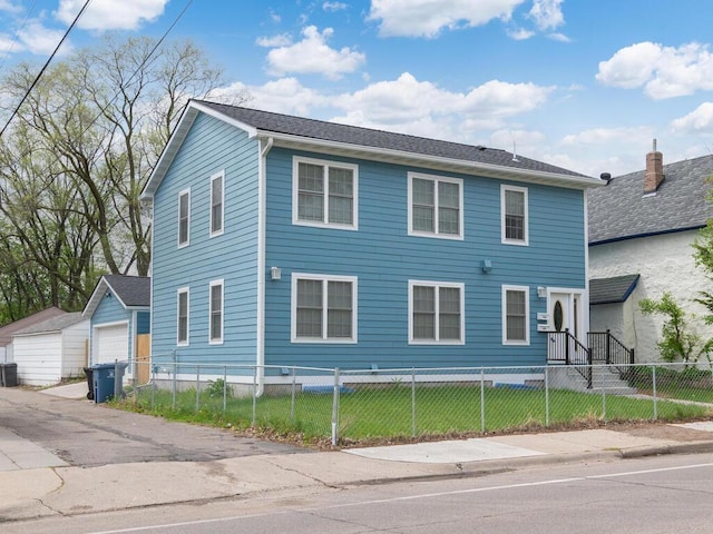 view of front of property featuring a garage