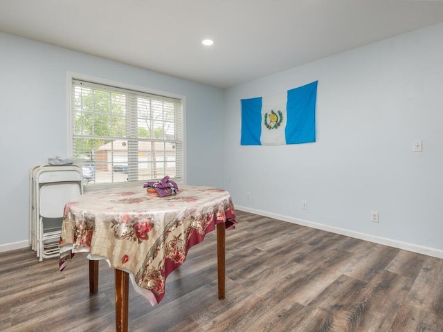 dining area featuring dark hardwood / wood-style floors