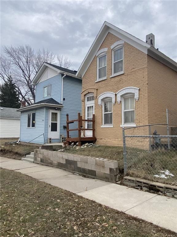 view of front of home with a wooden deck