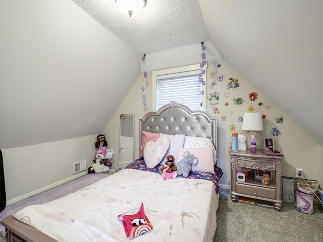 bedroom featuring a textured ceiling, vaulted ceiling, and carpet