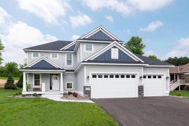 craftsman house featuring a front yard and a porch