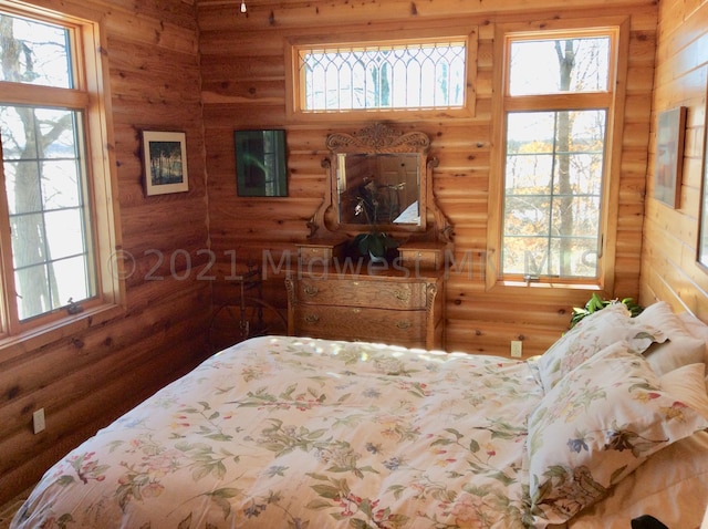 24557 Walden Rd, Rochert, MN 56578 - bedroom featuring rustic walls
