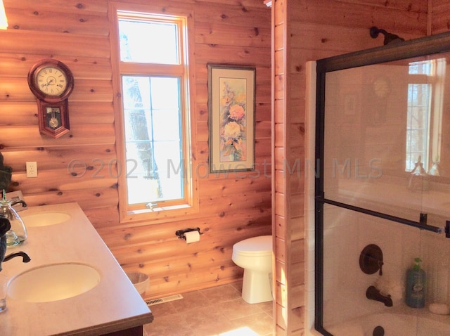 24557 Walden Rd, Rochert, MN 56578 - full bathroom featuring log walls, a sink, double vanity, and a stall shower