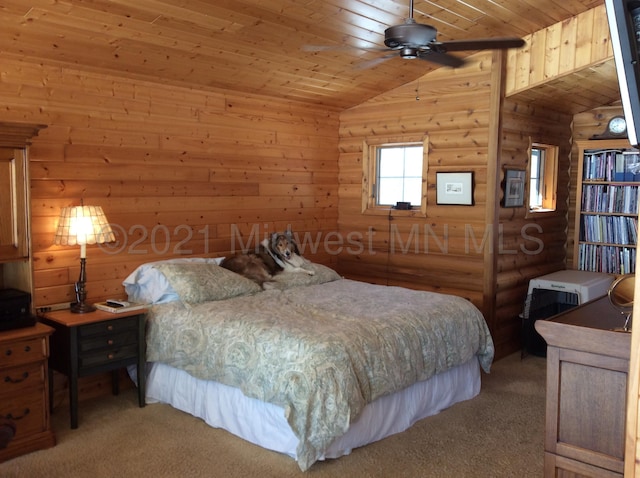 bedroom with light carpet, lofted ceiling, ceiling fan, wooden ceiling, and wooden walls