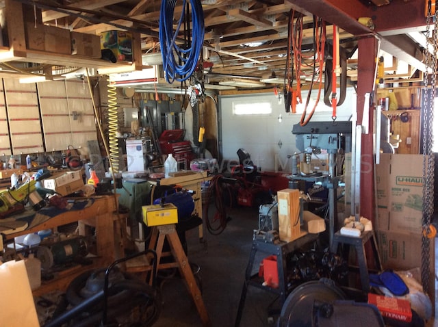 24557 Walden Rd, Rochert, MN 56578 - garage featuring a workshop area