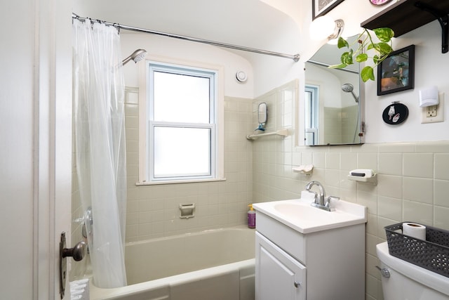 full bathroom with backsplash, tile walls, toilet, shower / bath combination with curtain, and large vanity