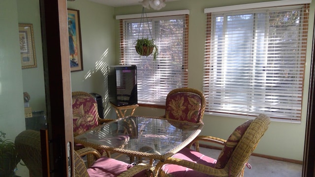 view of carpeted dining area