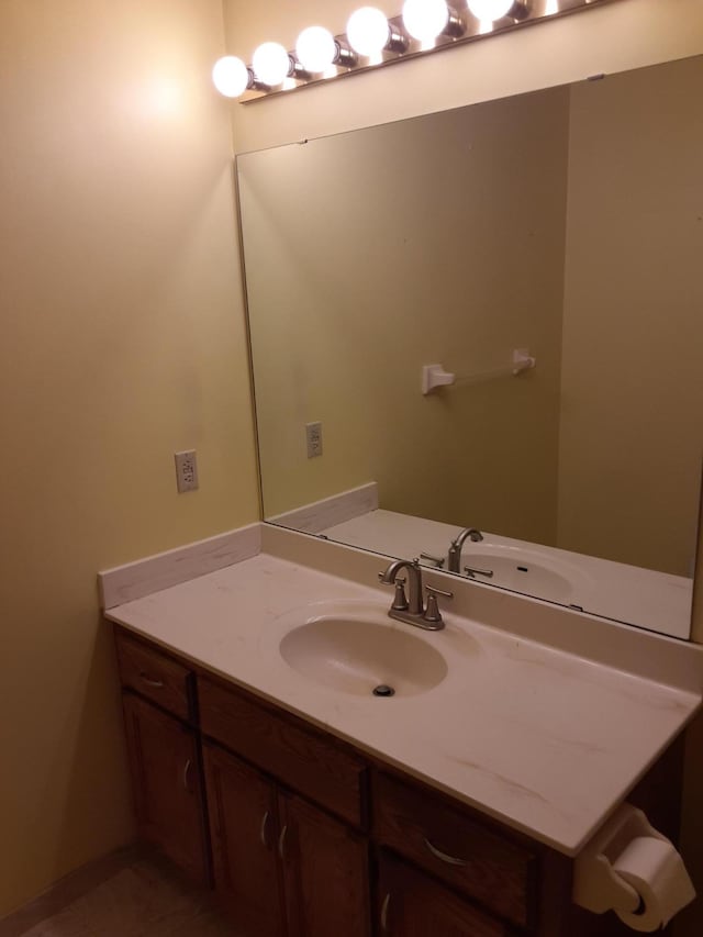 bathroom with vanity with extensive cabinet space