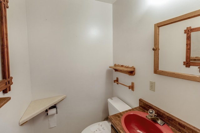 bathroom with sink and toilet