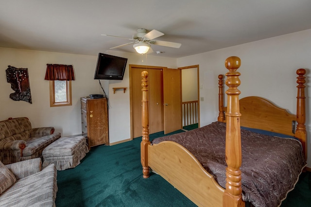 bedroom with ceiling fan and dark colored carpet