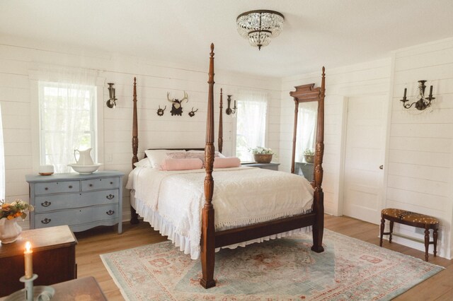 bedroom featuring hardwood / wood-style flooring