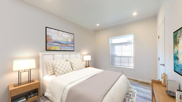 bedroom with light wood-type flooring