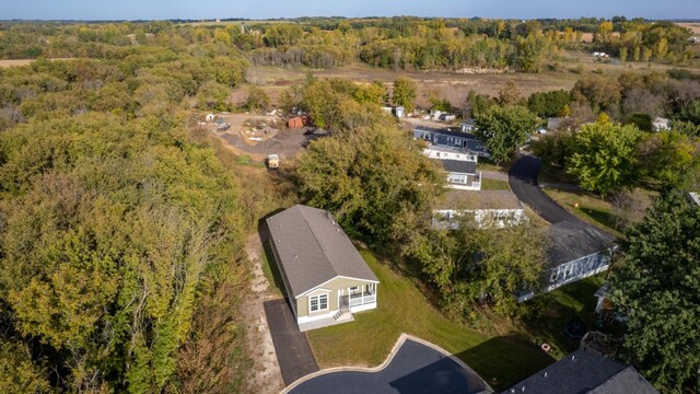 3611 85th St NW Unit 242, Oronoco Twp, MN 55960 - birds eye view of property with a wooded view