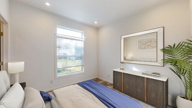 3611 85th St NW Unit 242, Oronoco Twp, MN 55960 - bedroom featuring multiple windows, light wood-style floors, baseboards, and recessed lighting