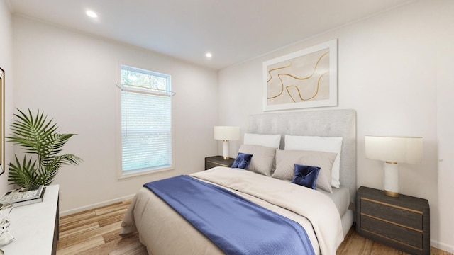 3611 85th St NW Unit 242, Oronoco Twp, MN 55960 - bedroom featuring baseboards, recessed lighting, and wood finished floors