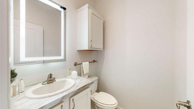 3611 85th St NW Unit 242, Oronoco Twp, MN 55960 - bathroom with vanity and toilet