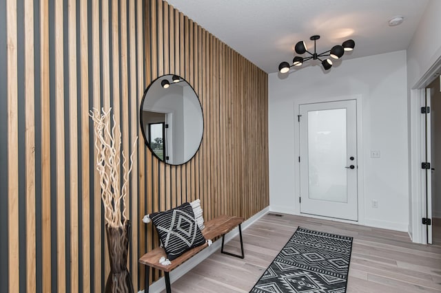 entrance foyer with light hardwood / wood-style flooring