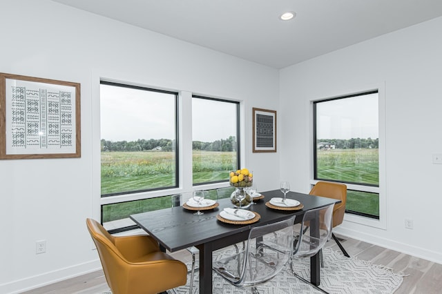 2811 Wildflower Ln SW, Rochester, MN 55902 - dining space featuring light wood-type flooring, baseboards, and recessed lighting