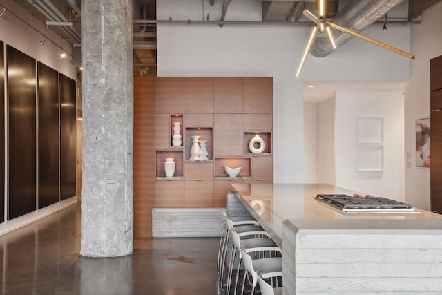 kitchen featuring kitchen peninsula and a breakfast bar