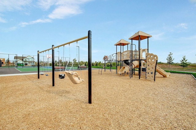 view of playground featuring tennis court