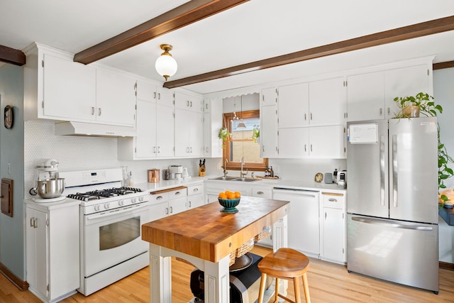 625 5th Ave S, Hopkins, MN 55343 - kitchen with white appliances, beamed ceiling, light countertops, premium range hood, and light wood-style flooring
