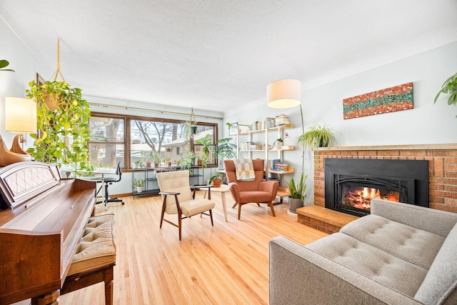 625 5th Ave S, Hopkins, MN 55343 - living room featuring a fireplace and wood finished floors