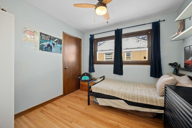 625 5th Ave S, Hopkins, MN 55343 - bedroom with light wood finished floors and a ceiling fan
