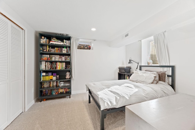 625 5th Ave S, Hopkins, MN 55343 - bedroom featuring light carpet, recessed lighting, and a closet