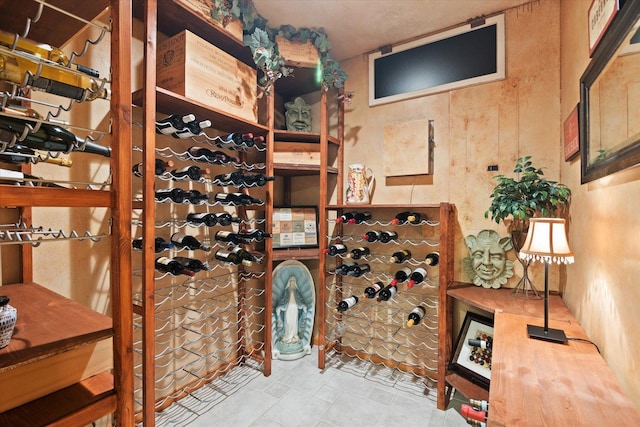 wine cellar featuring light tile floors