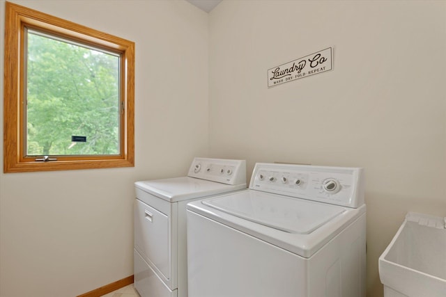 laundry room featuring sink and washing machine and dryer