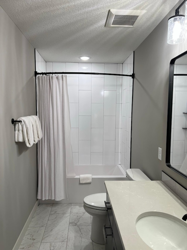 full bathroom featuring toilet, shower / bath combination with curtain, tile flooring, oversized vanity, and a textured ceiling