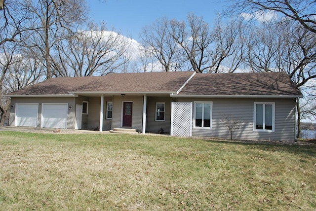 single story home featuring a front yard and a garage