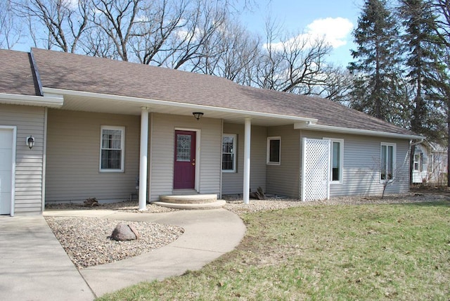 ranch-style house with a front lawn