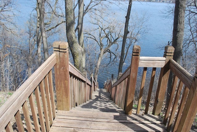 wooden terrace with a water view