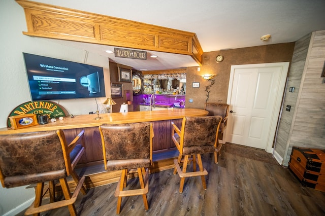 bar featuring wood-type flooring