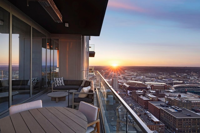 view of balcony at dusk