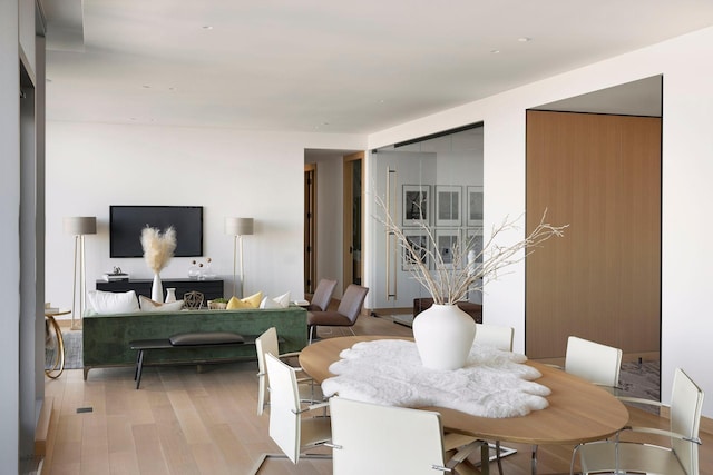 dining room featuring light hardwood / wood-style flooring