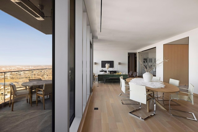 dining room featuring light hardwood / wood-style flooring