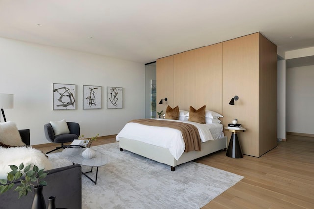 bedroom featuring light hardwood / wood-style flooring