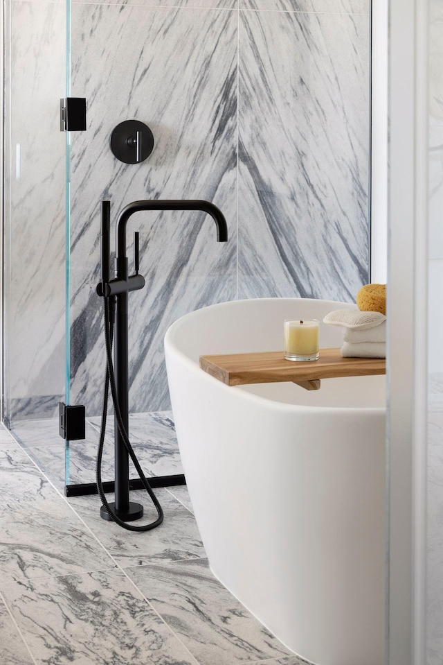 interior details with a shower with shower door